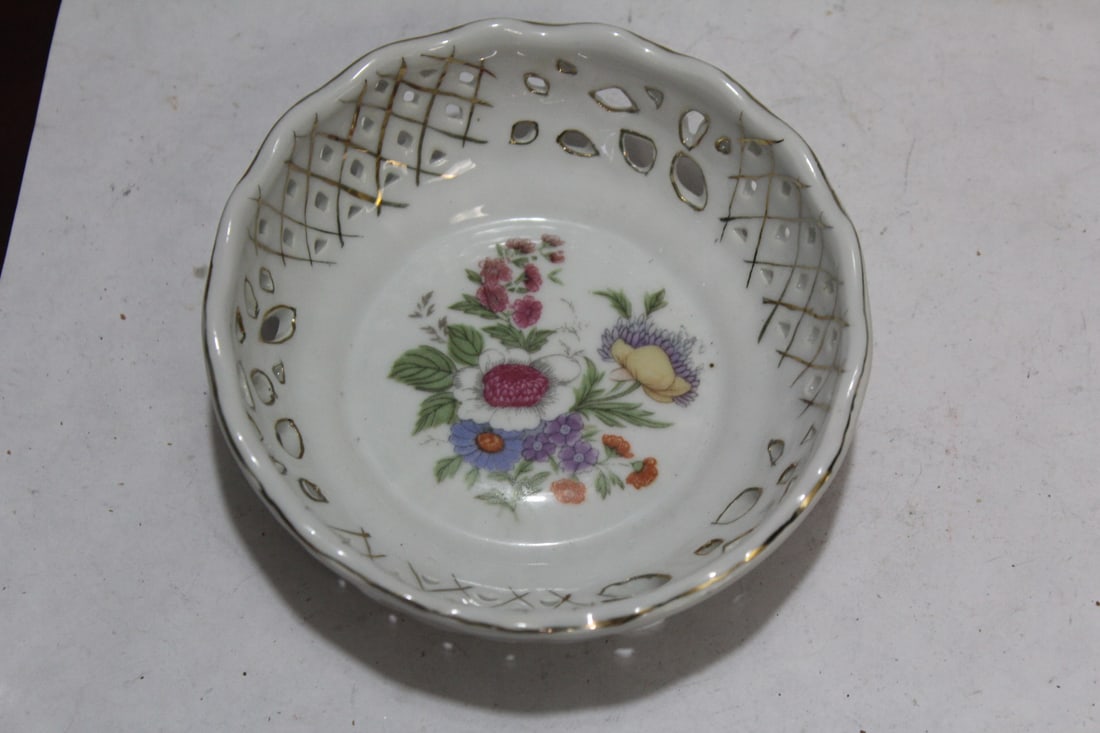 A Reticulated Floral Bowl: 5 1/4" in diameter