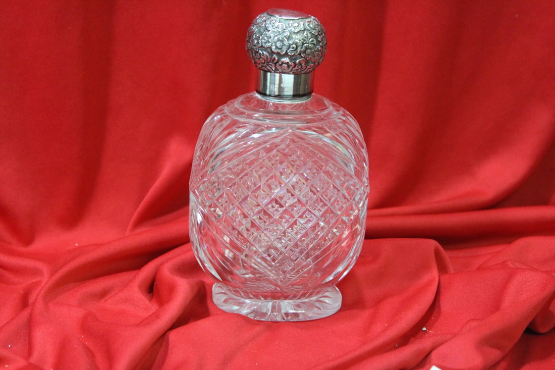A Sterling Top Cut Glass Flask: 6 1/4" tall - marked and monogrammed - probably around 100 years old