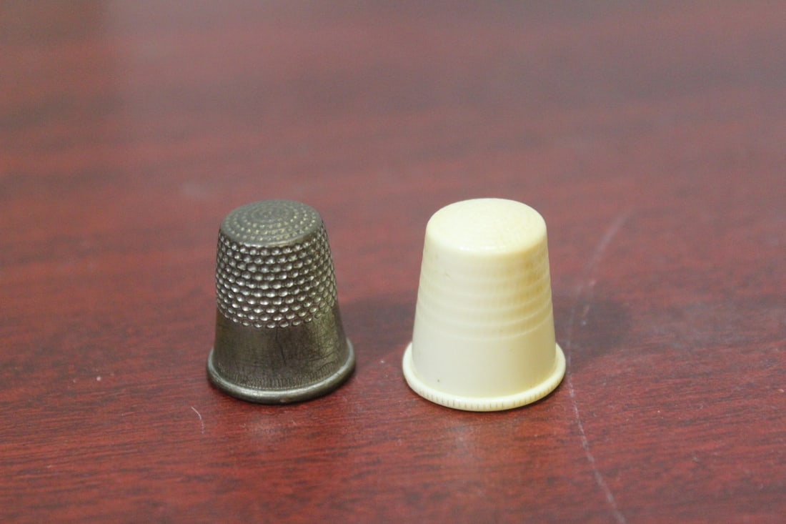 Lot of 2 Thimbles: as shown
