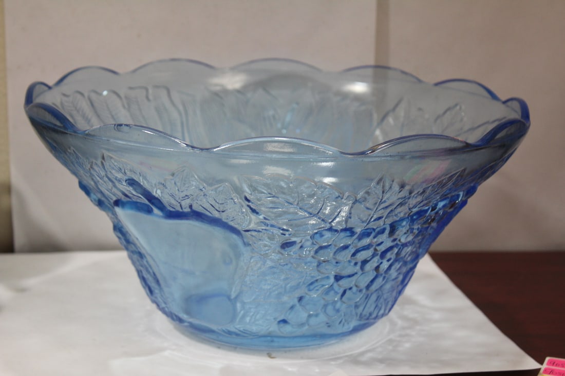 A Large Ice Blue Center Bowl: pressed glass - please note: chip as shown, but hardly noticeable - 12 1/2" in diameter and 6" tall