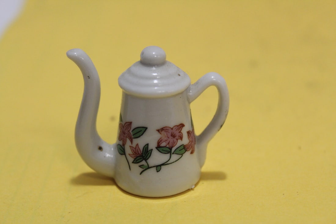 A Miniature Ceramic Teapot: 1 1/2" tall