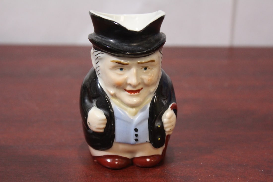 A Japanese Figeral Mug: 3 1/2" tall