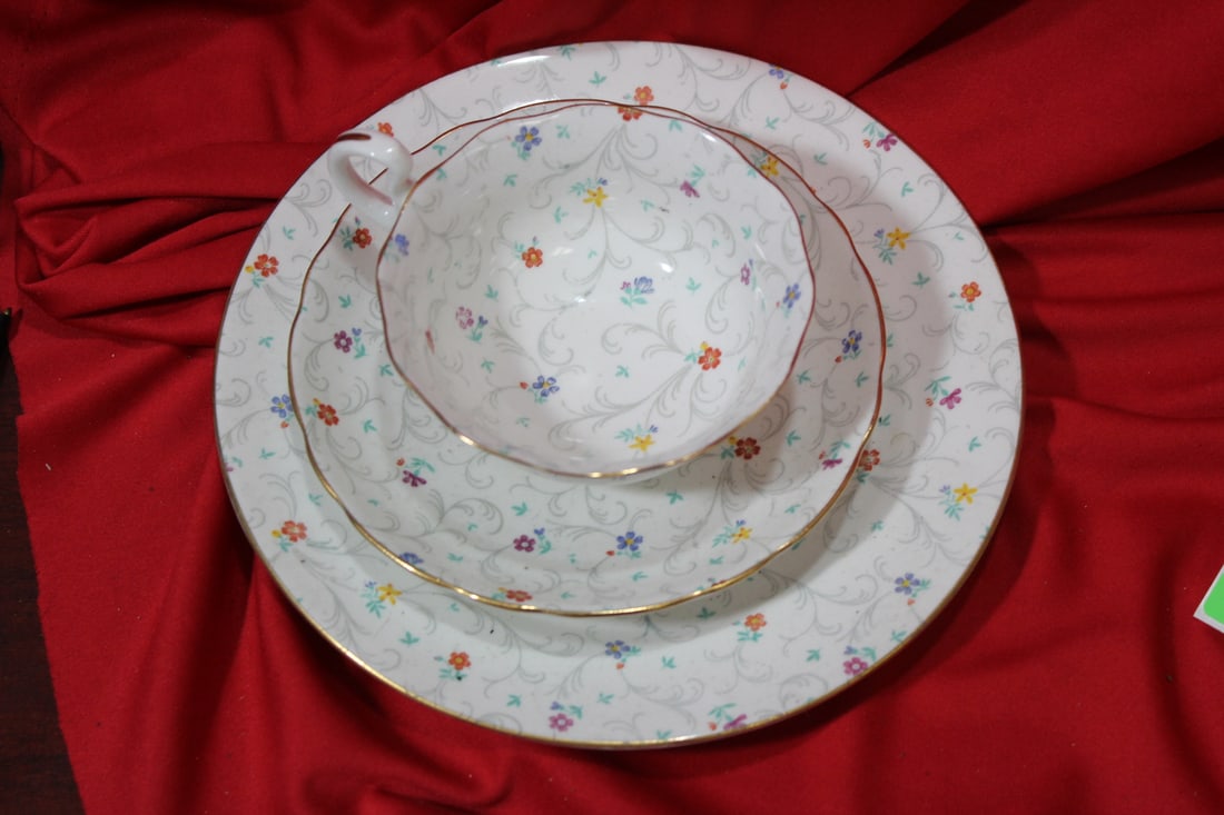 A 3 Piece Radfords Bone China Set: larger plate= 8 inches in diameter