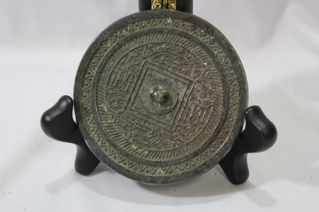An Antique/Vintage Chinese Bronze Mirror: nicely carved - exact age unknown - 3 1/2" in diameter