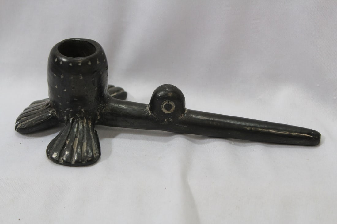 An African Ceramic Pipe: 7 1/4" across - tribe unknown