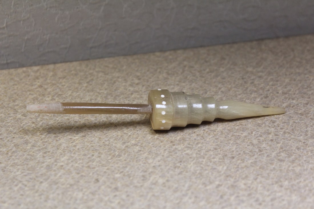 horn ornament(?): 5" across