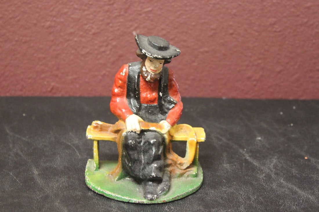 A Cast Iron Sitting Amish Man: Vintage - probably 1950's - 5 inches tall