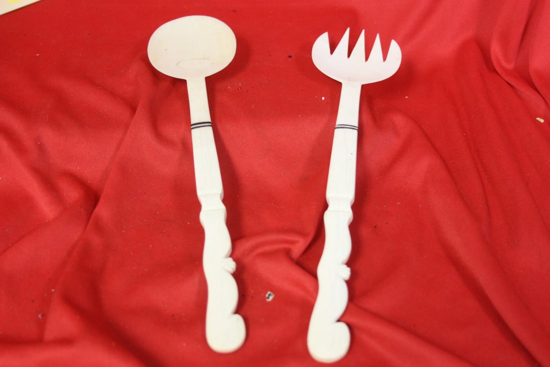 A Pair of Bone Utensils: 10" long
