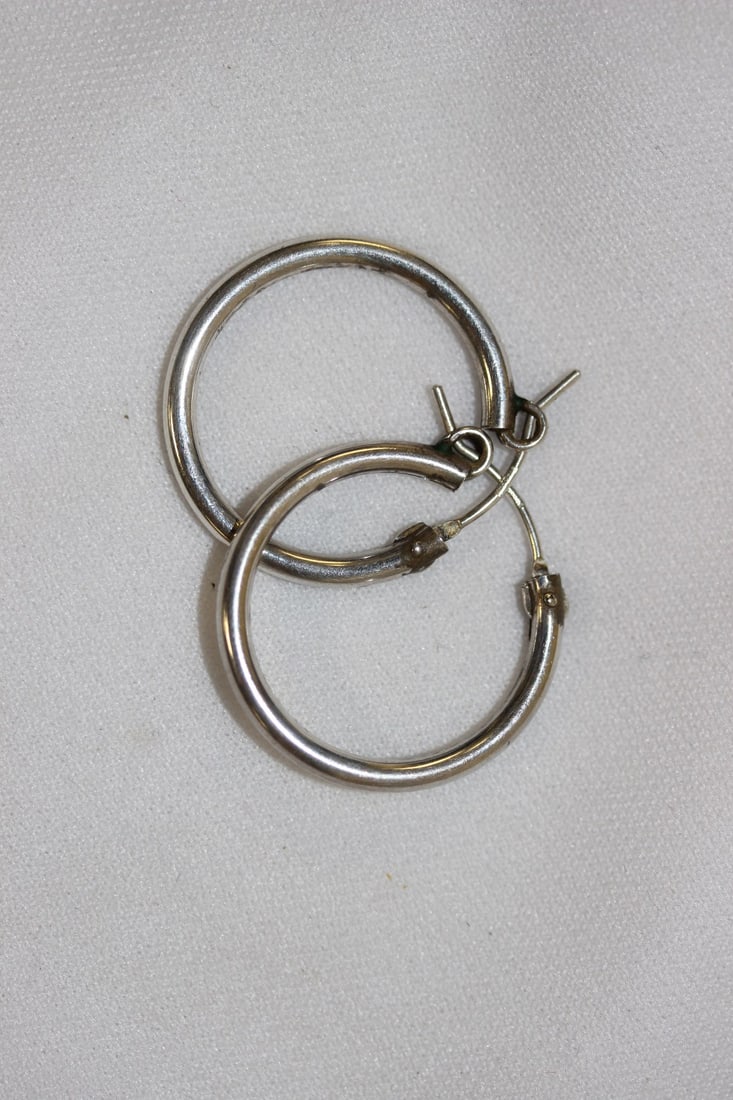 A Pair of Sterling Earrings: as shown