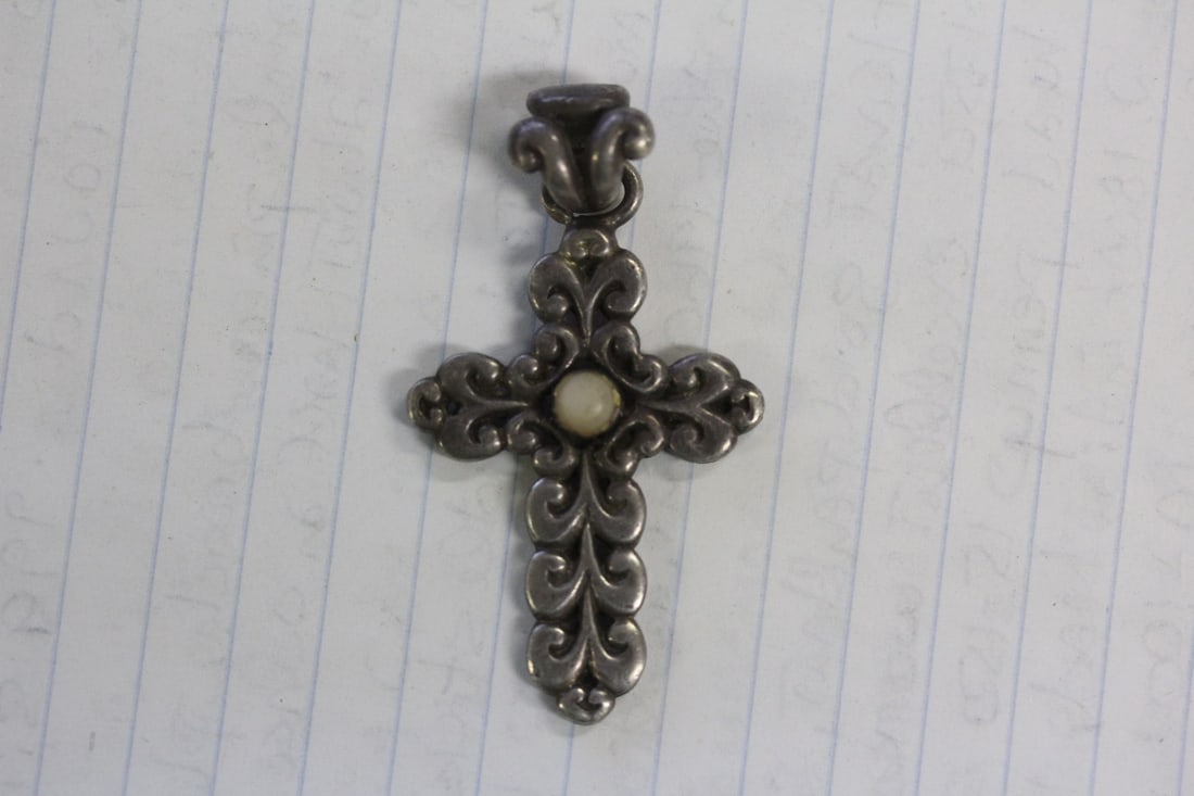 A Sterling Cross Pendant: as shown