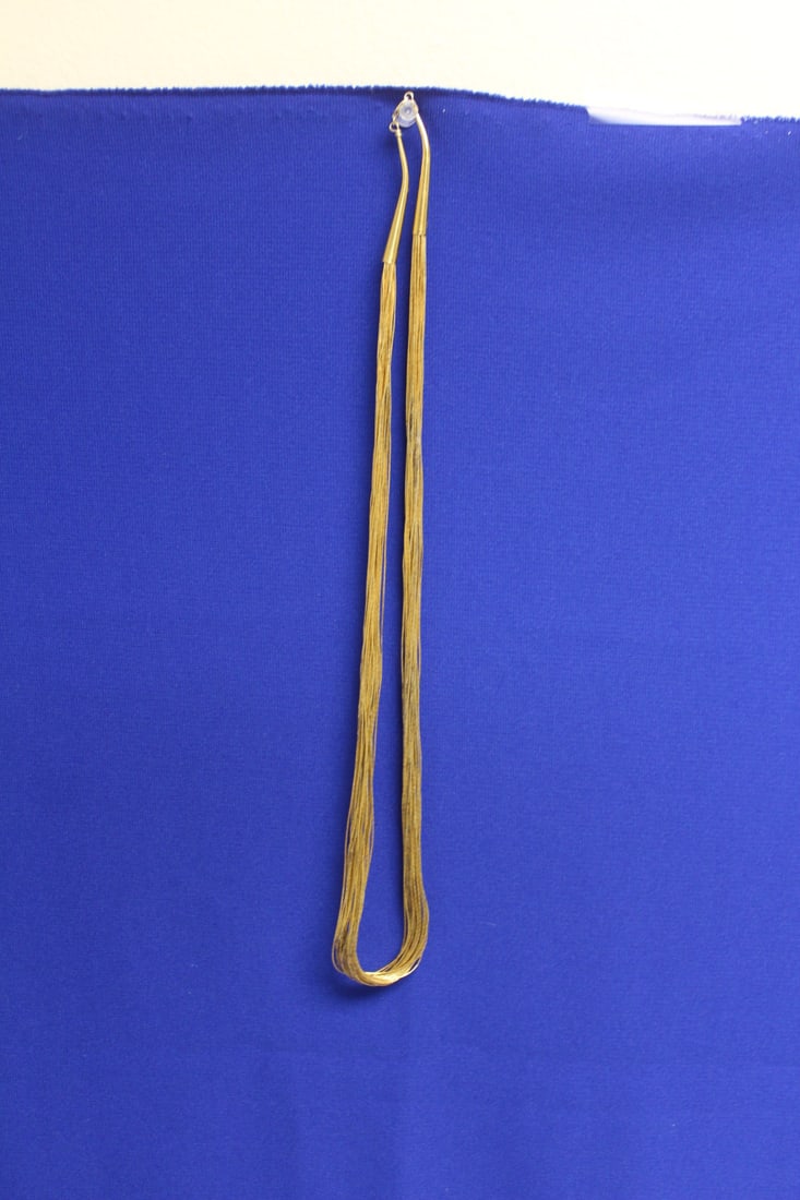 A Gold Plated over Sterling Liquid Silver Necklace: 15 inches long when clapsed
