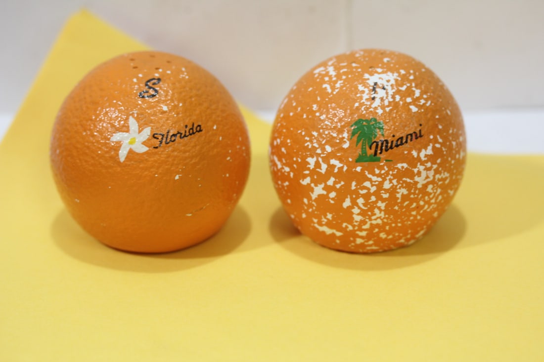 A Pair of Orange Form Salt and Pepper Shaker: please note= worn as shown - 2 1/2" tall