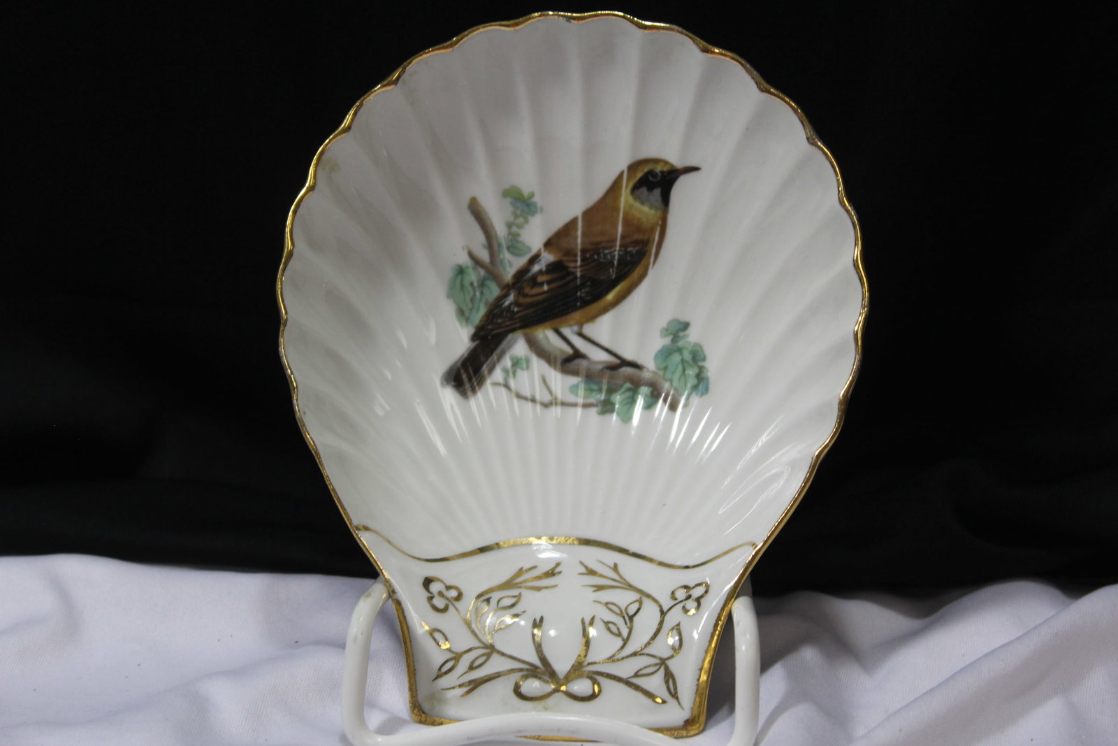 Fireproof Porcelain Dish: Lourioux Le Faune Shell Shape dish - bird motif - 6 5/8" across