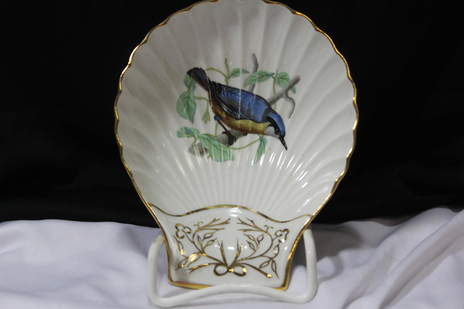 Fireproof Porcelain Dish: Lourioux Le Faune Shell Shape dish - bird motif - 6 5/8" across