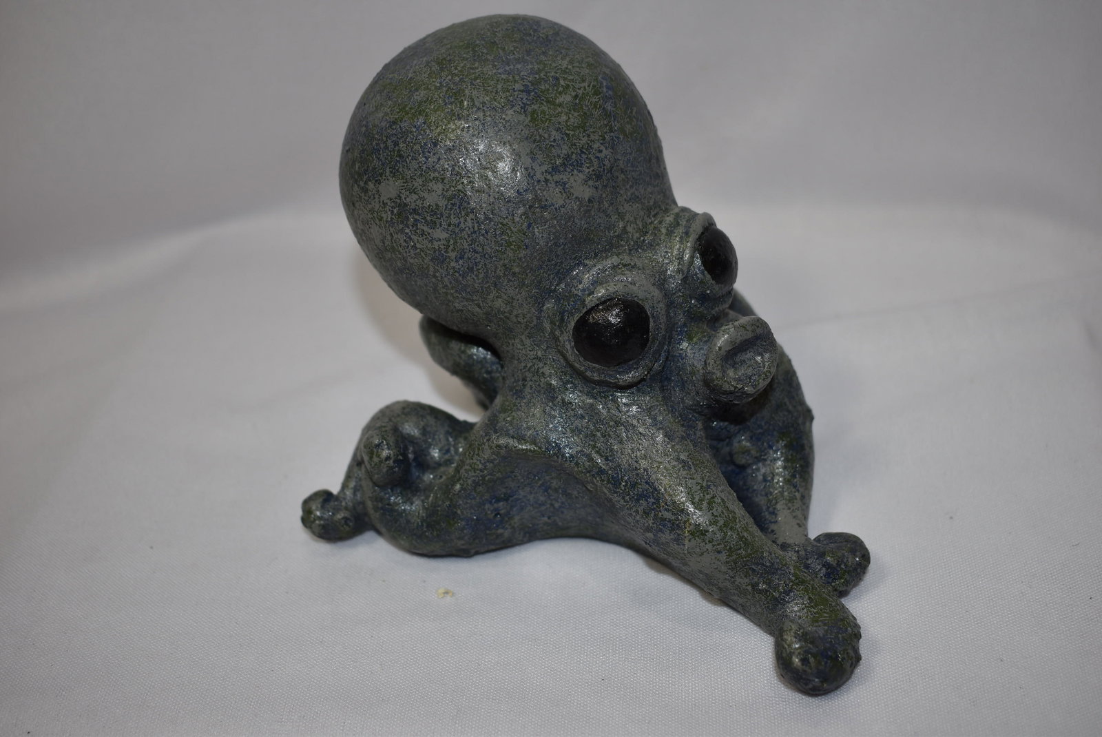 An Octopus Figurine: some sort of stone construction - 5 inches tall