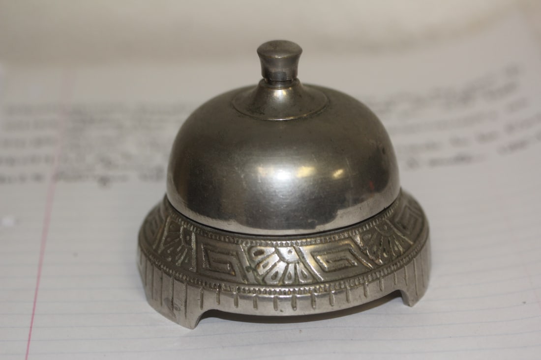 Antique Hotel Table Bell: by New Departure bell company - footed - 3" tall