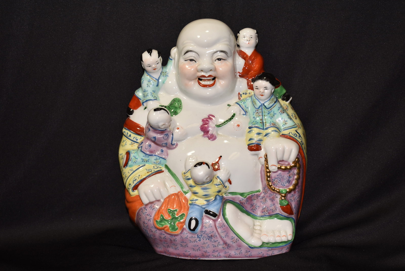 A Chinese Vintage Buddha with Children: signed - 11 inches tall