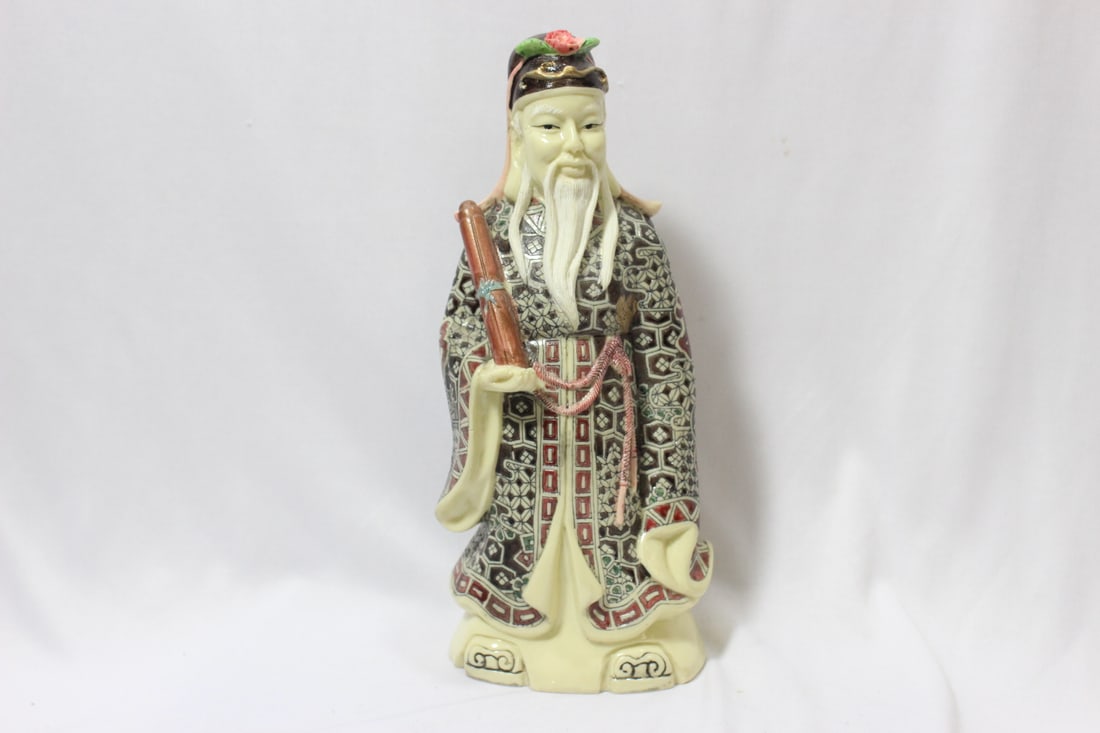 A Well Carved Chinese Resin Figure: Please note: minor bottom chips as shown - 10" tall