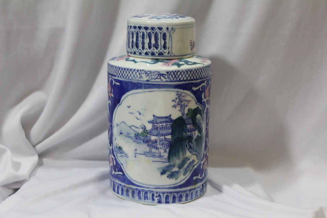 A Ceramic Chinese Jar: 7 3/4" tall - signed
