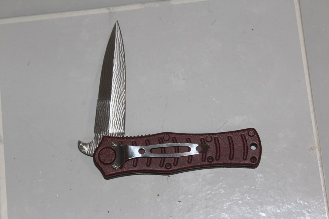 A Pocket Knife: 4 1/2" long