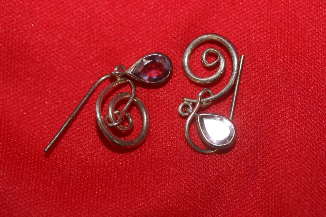 A Pair of Sterling Earrings: Amethyst colour stone