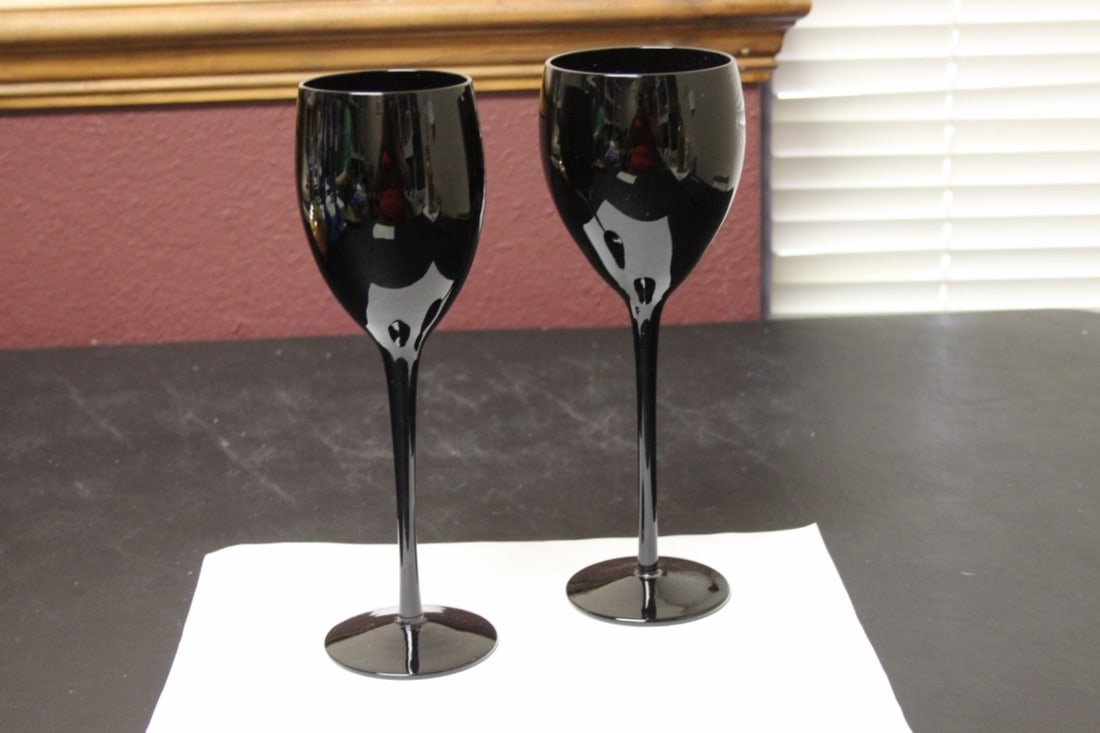 A Pair of Maroon Glass Goblets: 9 1/4" tall