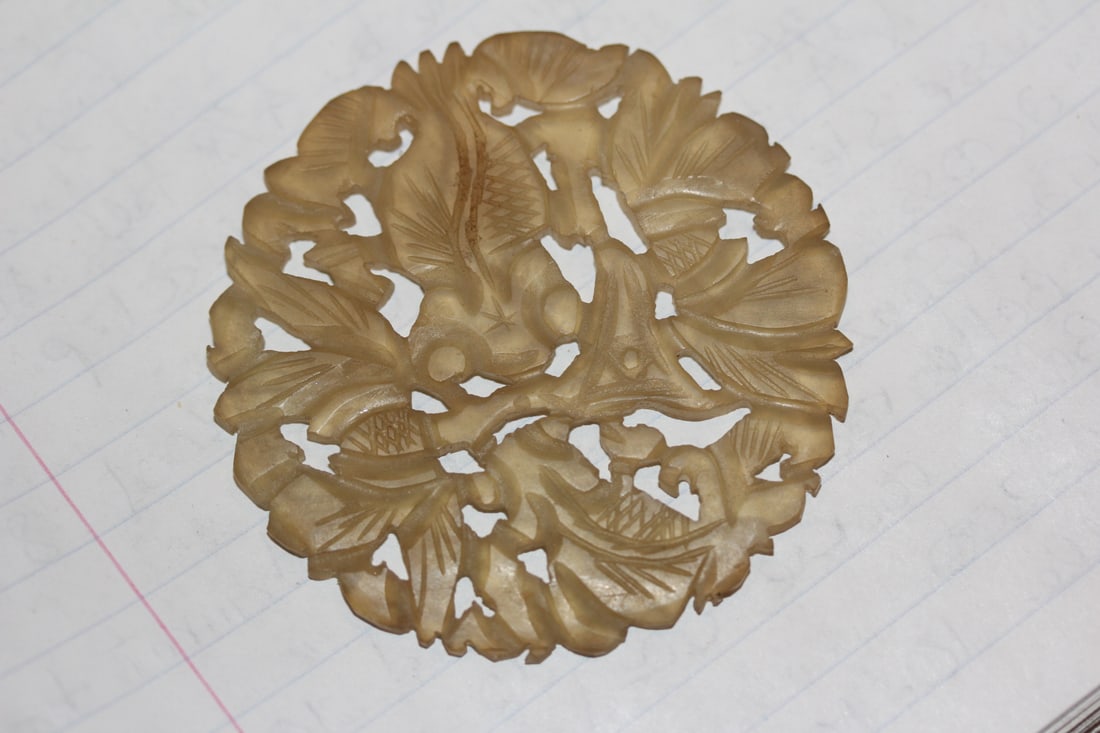 Jade Disc: well carved - 2 3/8" in diameter