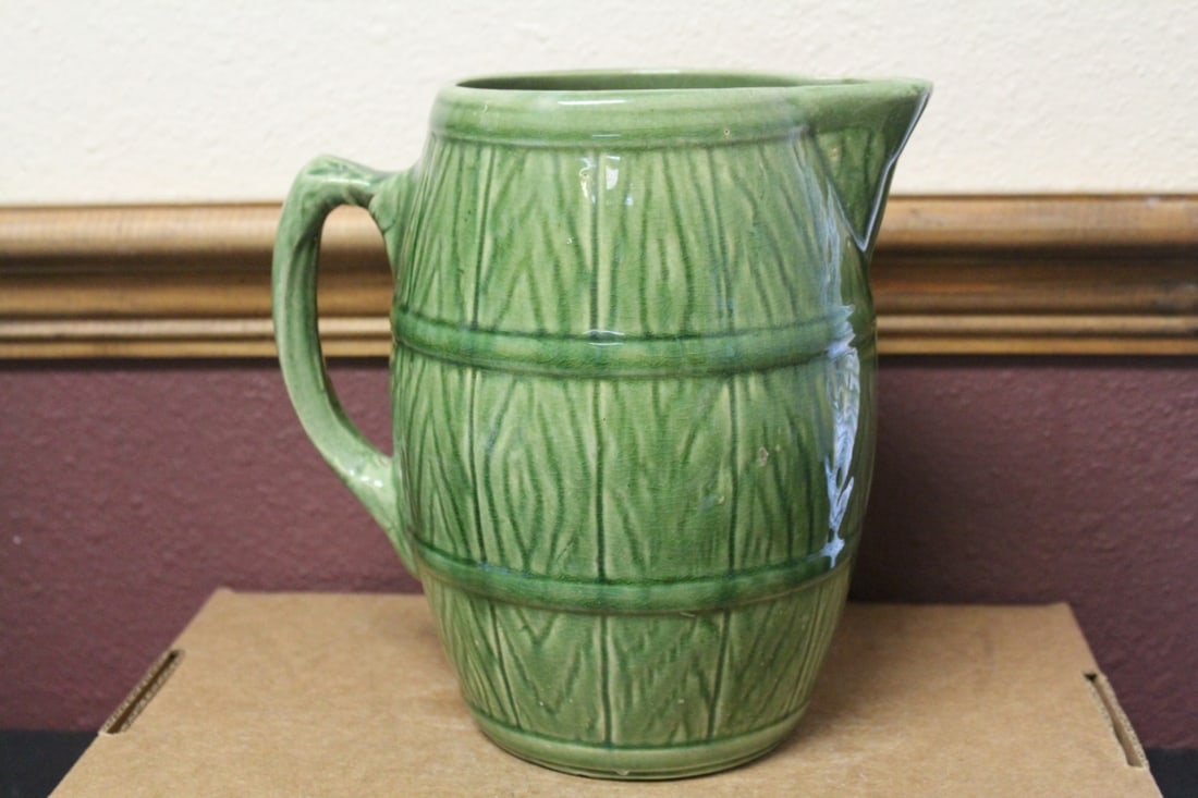 A Vintage Pitcher: signed on the bottom - some manufacture imperfection - 8 1/4" tall