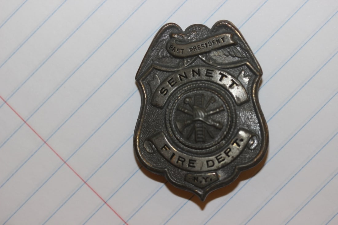 A Fire Department Badge - Vintage: Past president