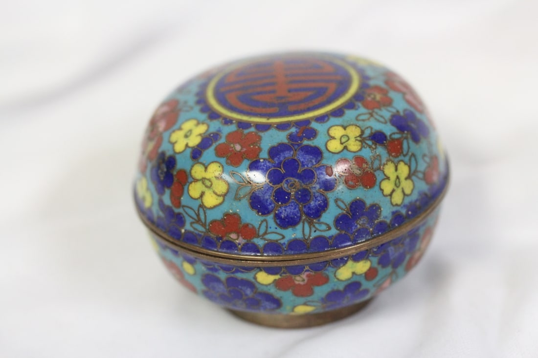 An Antique Chinese Cloisonne Box: 2 5/8" in diameter - please note: loss underneath the lid as shown