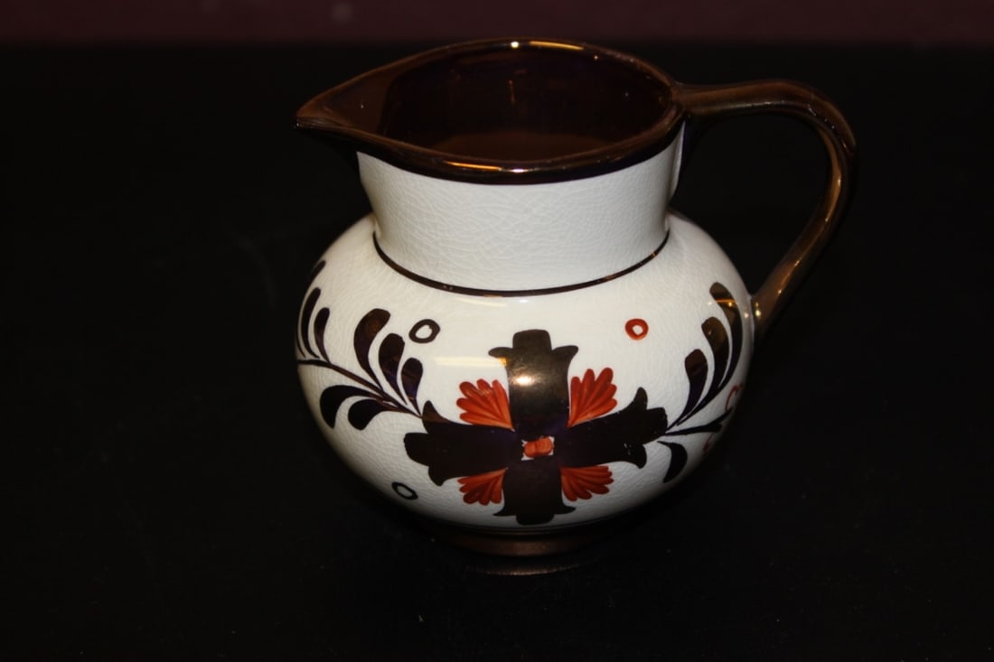 An Old Castle Copper Ceramic Luster Creamer: 3 1/4 inches tall