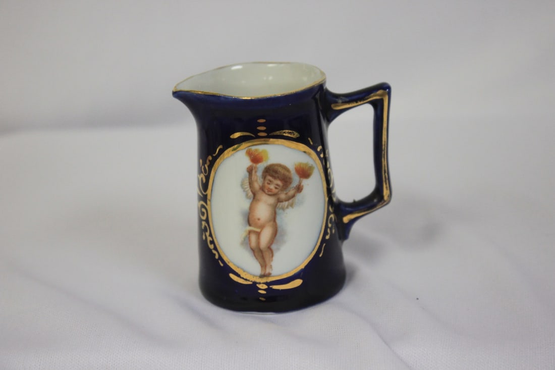 A Small Handpainted Pitcher: 2 1/2" tall
