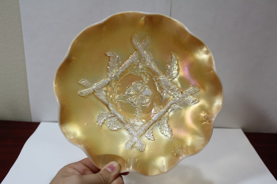 A Carnival Glass bowl: 9 inches in diameter