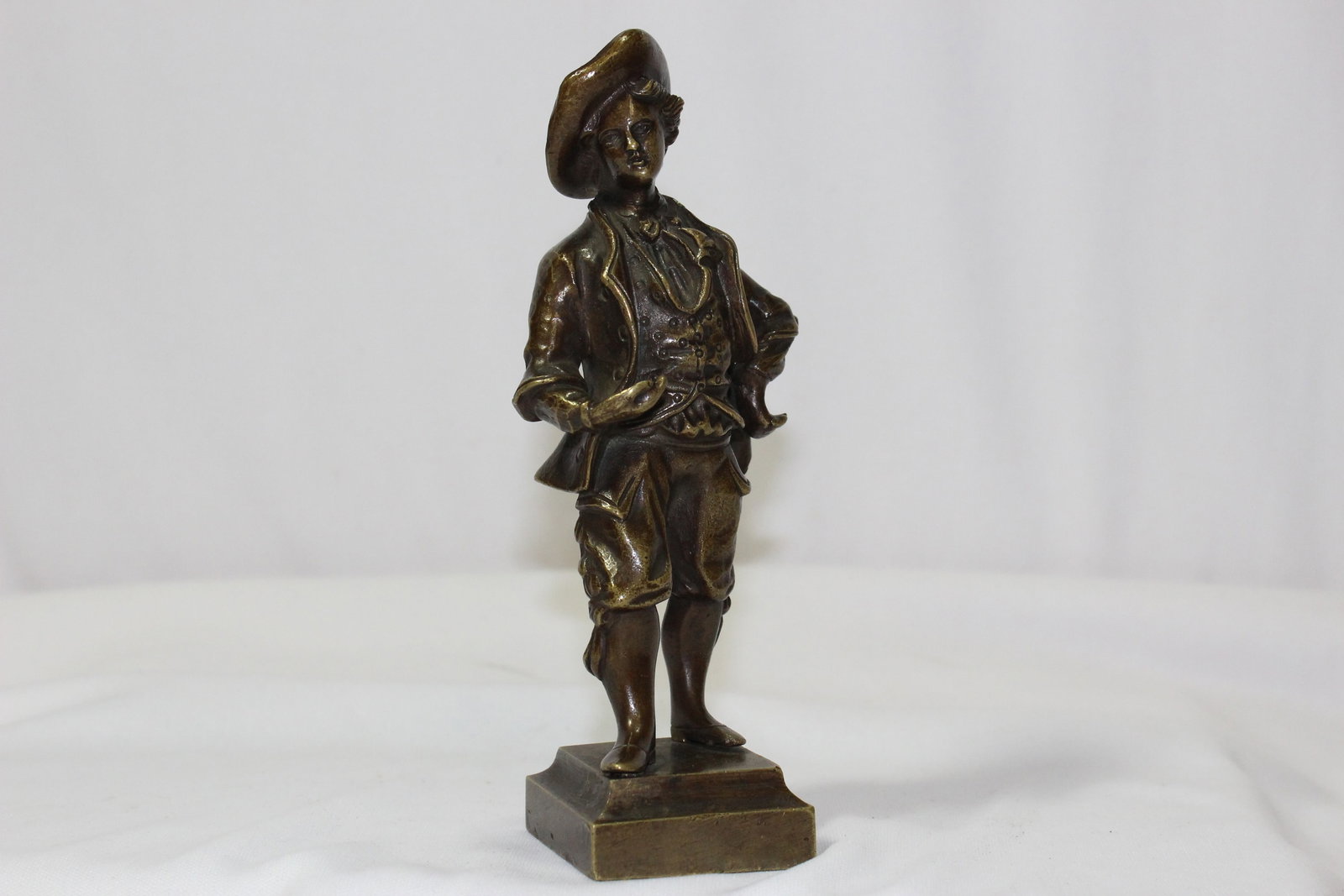 A Solid Bronze Boy Figurine: old - 6" tall