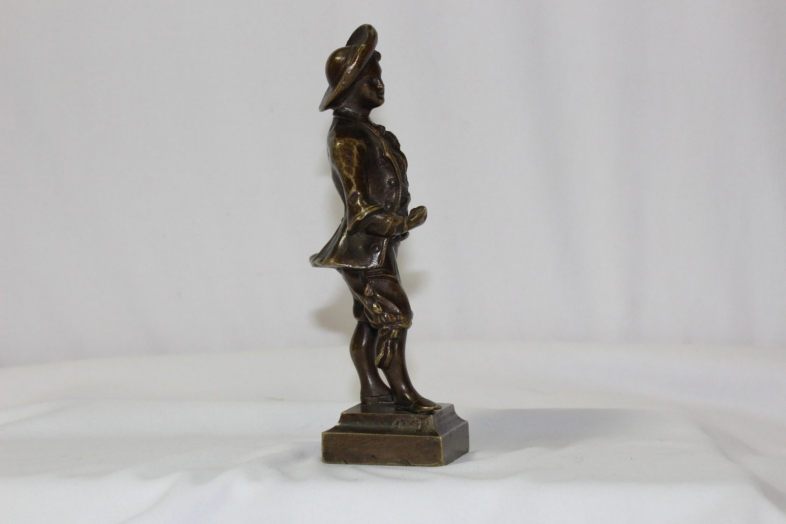 A Solid Bronze Boy Figurine - 4
