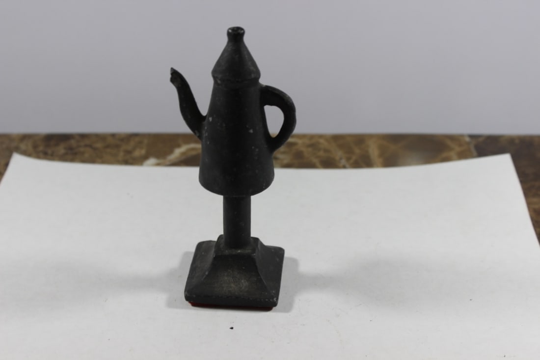 A Solid Metal Teapot on Stand: 5" tall