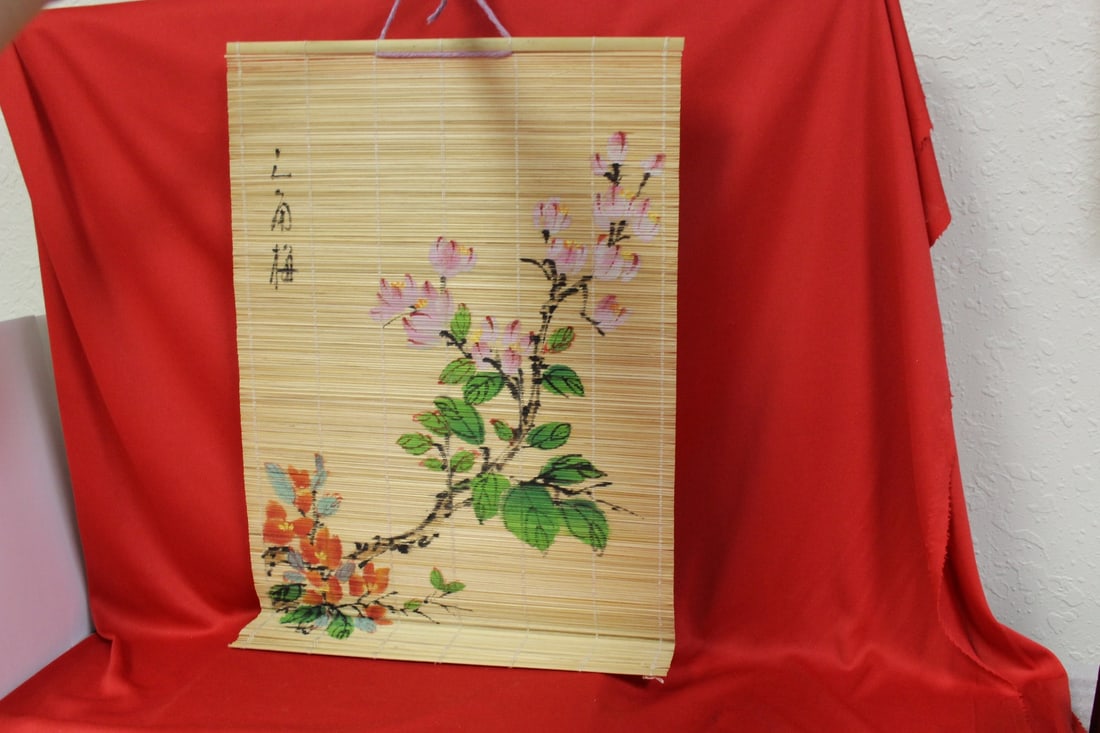 A Rattan Hand Painted Mat: 12" x 17 3/4" - signed