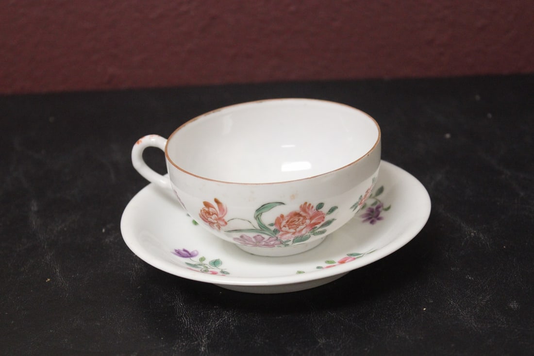 An Export Chinese Cup and Saucer: saucer= 5 1/2" in diameter - marked China - most likely from the early 20th century - rare pattern - cup= egg shell thin