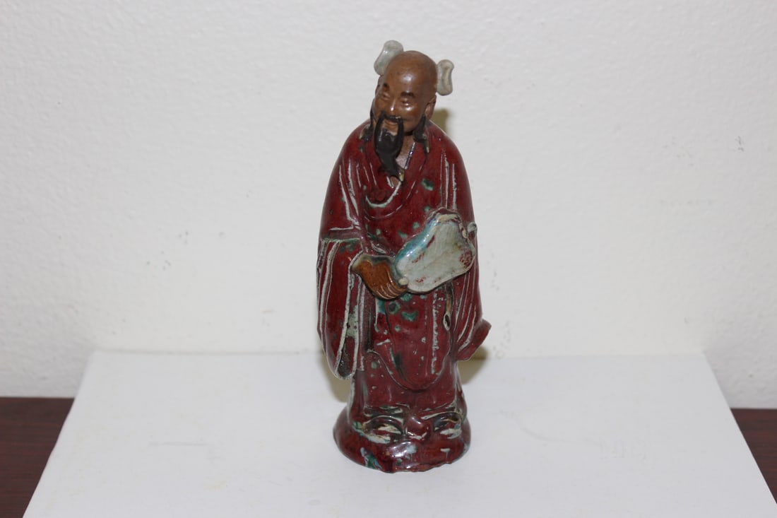 A Well Carved Mud Figurine: Marked "China" - early 20th century - 6 3/4" tall