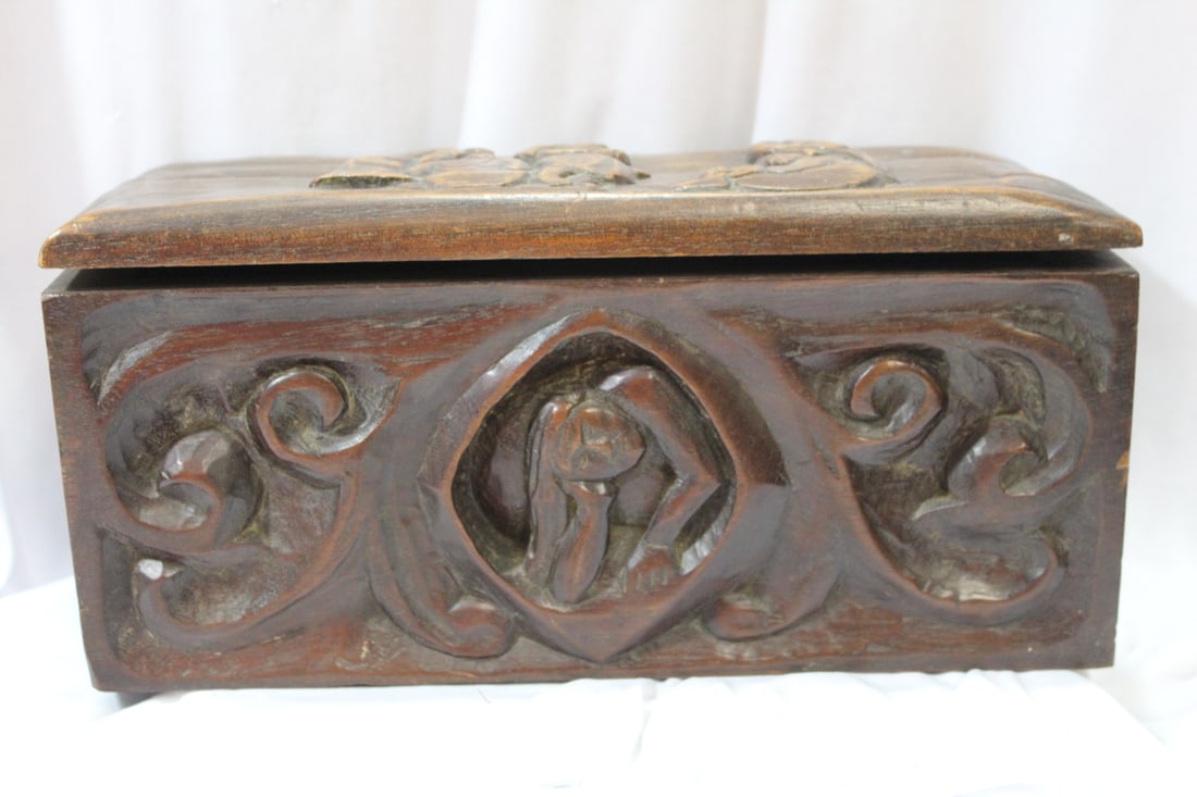 An Antique/Vintage Carved Box: please note: no key, cannot be completely closed due to the locked position - origin unknown - 13 1/2" x 6 1/2" x 6 1/2"