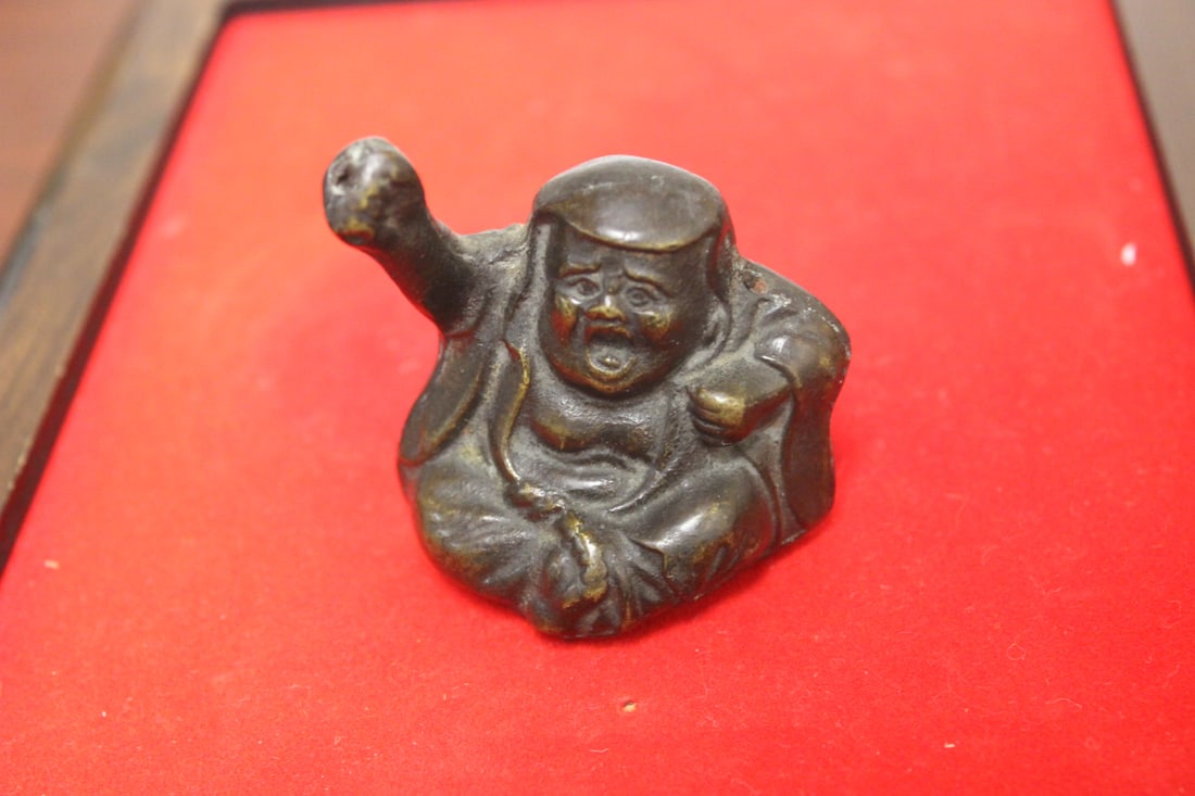 An Antique Bronze Japanese Netsuke: 2" across
