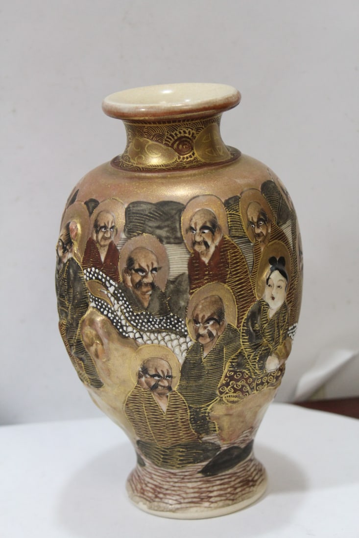A Japanese Kyoto School Satsuma Vase: 19th century - raised design - Kozan signature - 7 1/2" tall