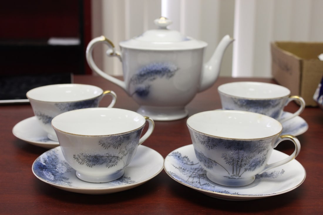 A Kutani (Japanese) Teapot, Cup and Saucer: Teapot measures at 9" wide