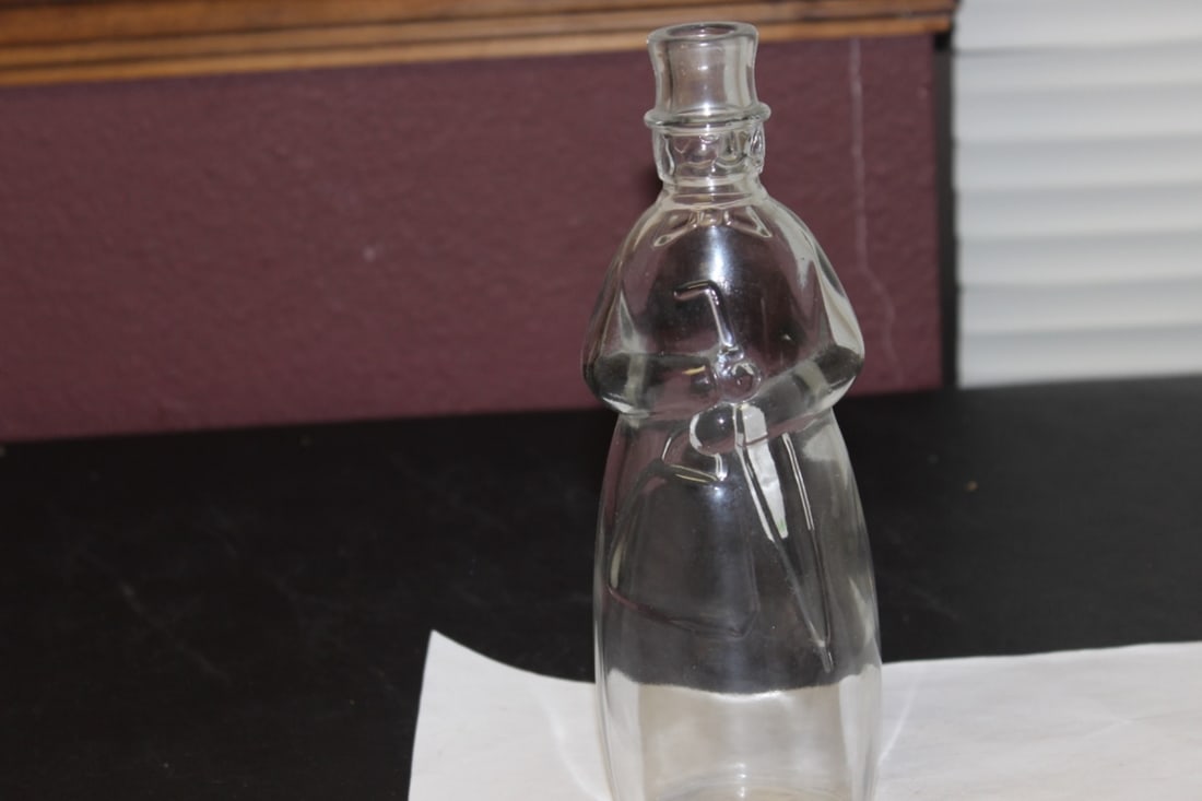 A Figureal Decanter Bottle: No stopper - 9" tall