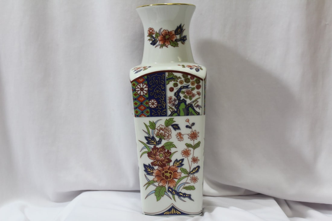 An Oriental Ceramic Vase: 10 1/4" tall