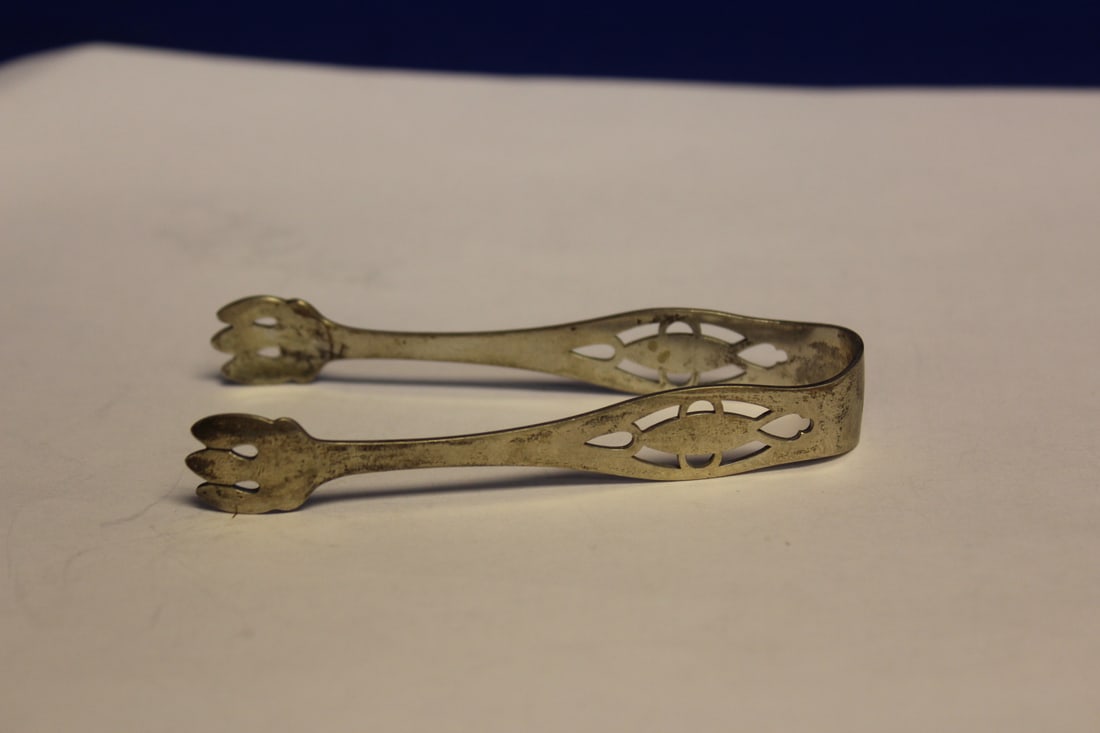 A Sterling Tong: 3 1/4" long