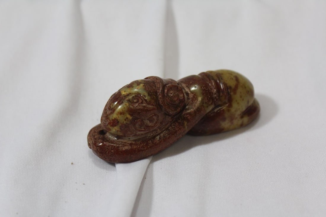 A Chinese Jade or Similar Hardstone Beast Pendant: 3 1/4" in length