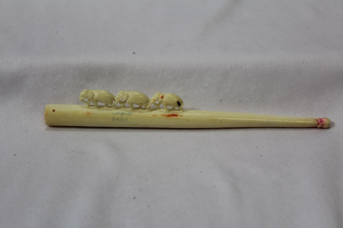 A Carved Bone Elephant Cigarette Holder: 5 3/8" long