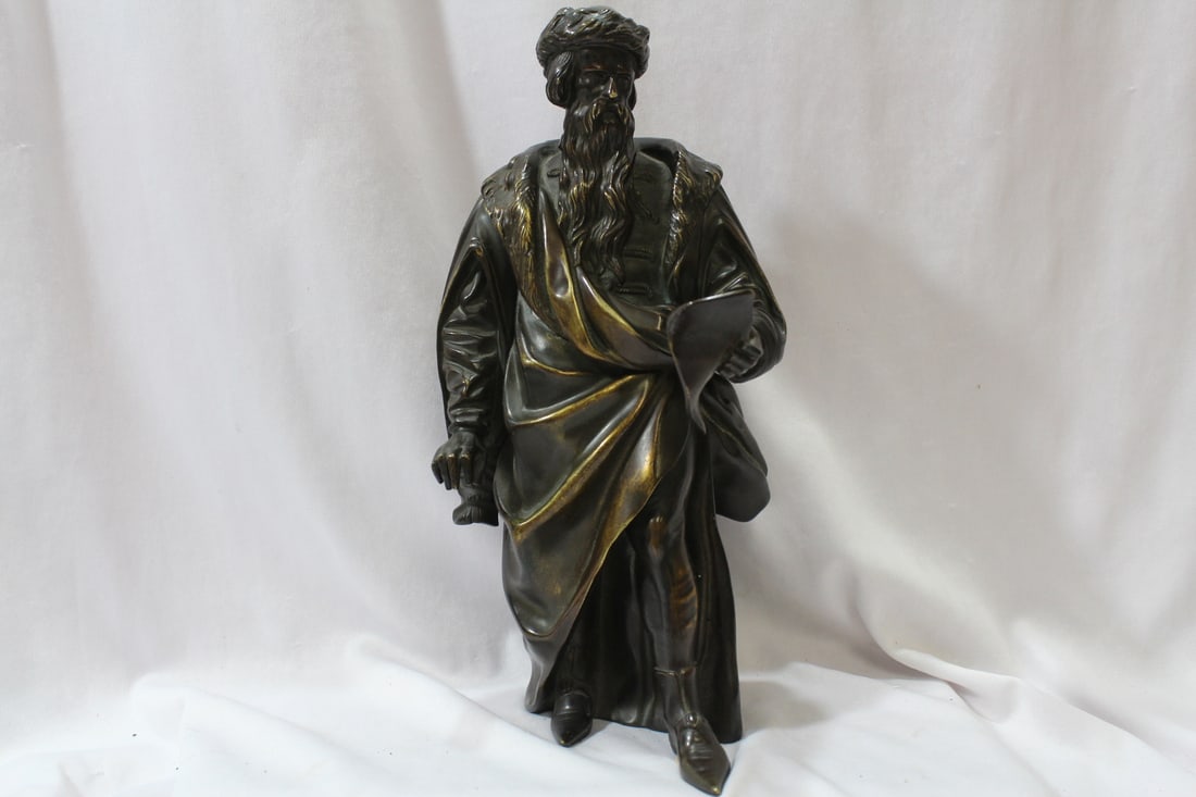 A Bronze Figurine: please note: iti s cut in half, I do not know if it is originally like that or not, but probably it is like that - 10 3/4" tall - nicely carved