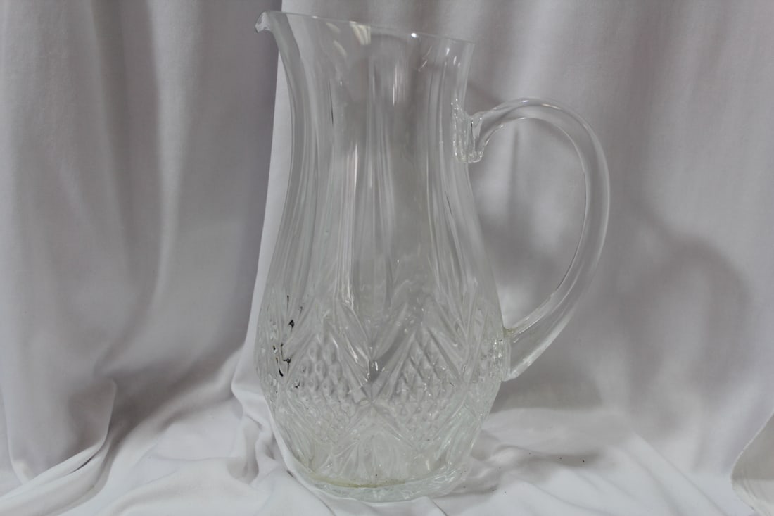 A Pressed Glass Pitcher: 9 1/2" tall